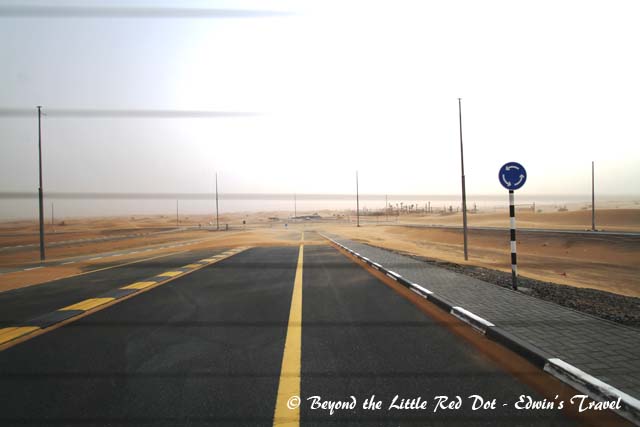 As we drove out of Dubai into the desert, we could see the sand storm covering up the road with sand.