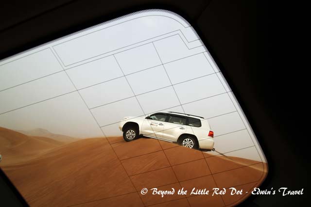 Another one got stuck on the top of the dune. They had to tow him out of the sand.