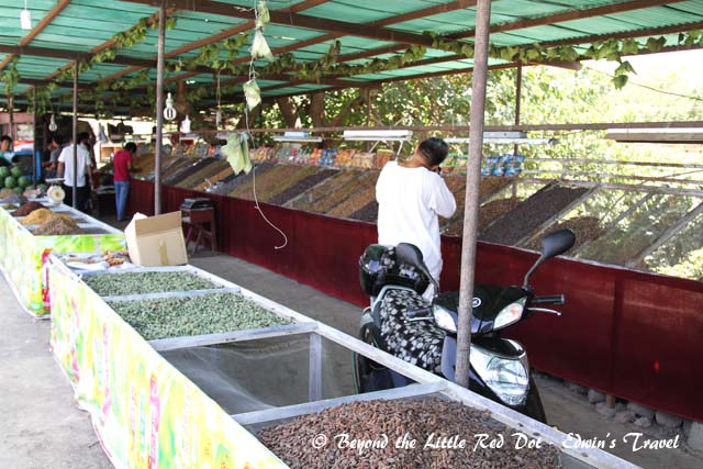 Different grades of raisins being sold.