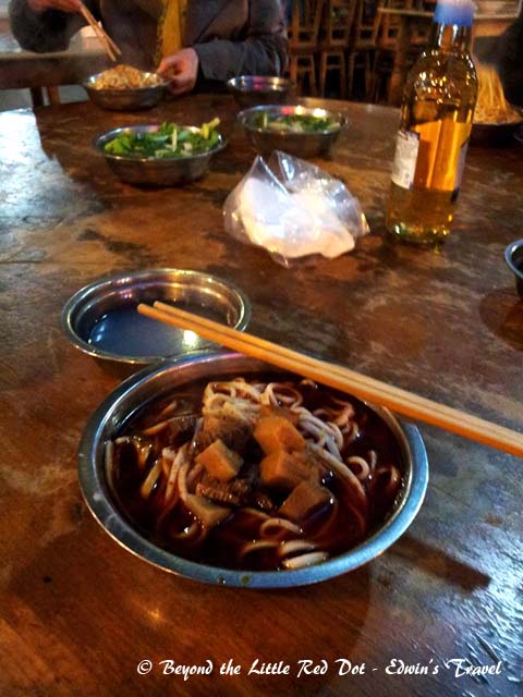 For dinner in Leshan, my Chinese suggested we try the street food. We found a reasonably clean stall and tucked into some beef noodles. Since this is Sichuan, everything comes with Mala and is 101% spicy.