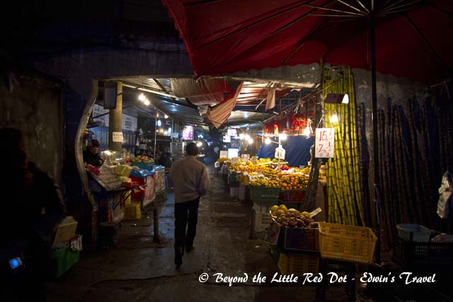 Passing by a small market in the alleyway near our hotel.