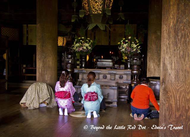 Praying for good luck.