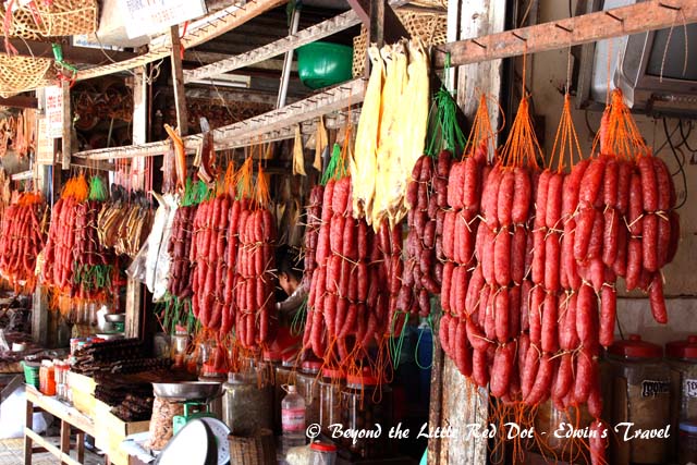 Dried sausages hanging from a shop in Psar Chaa.