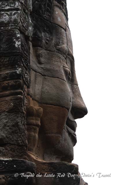 The Buddha faces are always smiling, even if viewed from the side.