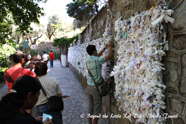 Pilgrims would write their wishes and tie it to the lattice on the wall.