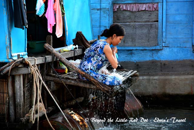 Washing her hair.