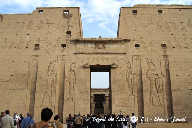The Temple of Horus. It is one of the best preserved temples in Egypt. The large carving of Horus, the falcon headed god can be seen on the wall of the temple.