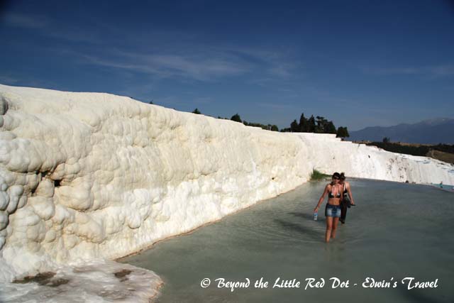The mineral rich waters are believed to have curative properties and people were bathing or wading in them.
