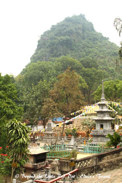 The temple is surrounded by mountains.