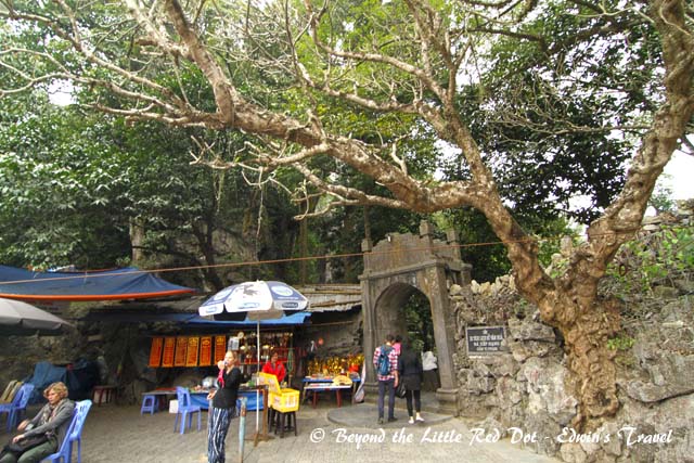 Even after taking the cable car to the top, we still had to do some climbing. This is the entrance to the cave with all the tired and sore tourists sitting around.