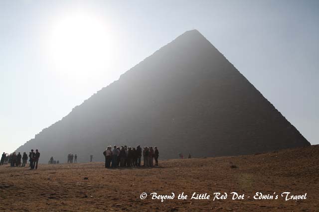 Pondering on ancient history in front of the Pyramids.