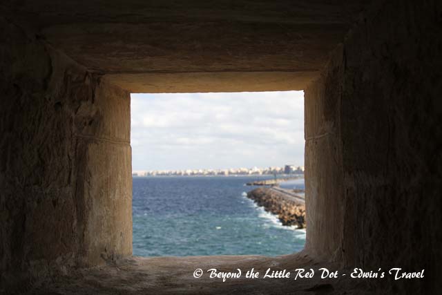 Looking through one of the windows in the fort, we can see the city of Alexandria.