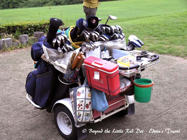 A lesson in productivity. We only had 1 caddy to service 4 of us. He uses this motorised cart to ferry our golf bags, carry drinks in the cooler box, selects and washes our clubs after play and he follows us throughout the 18 holes.
