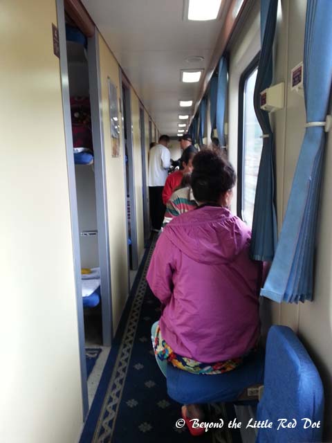 The common corridor outside serves as an impromptu dining area and chi chat corner.