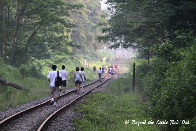As I approached the Bukit Timah Station, the small groups of people had congregated into a large crowd.
