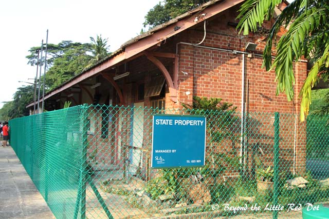 The Singapore government sure works fast. The station building was to be conserved and it was fenced up real quick.