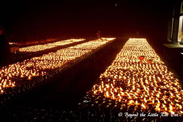 Thousands of oil lamps fill this small room and its like a furnace in there.