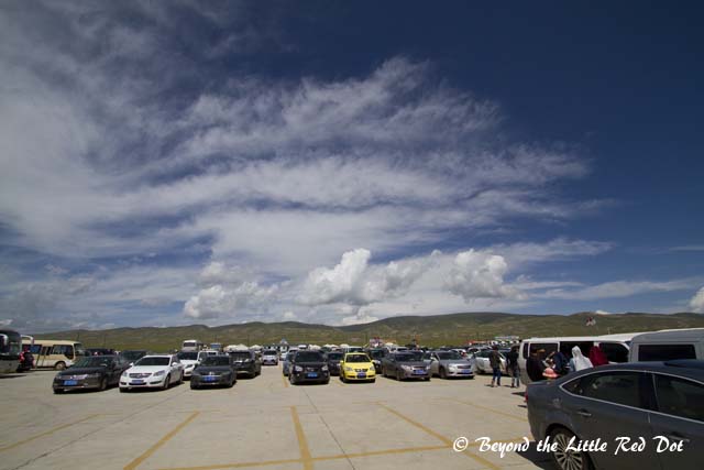 The public parking area where all visitors have to park their vehicles and take the internal buses to the lake side.