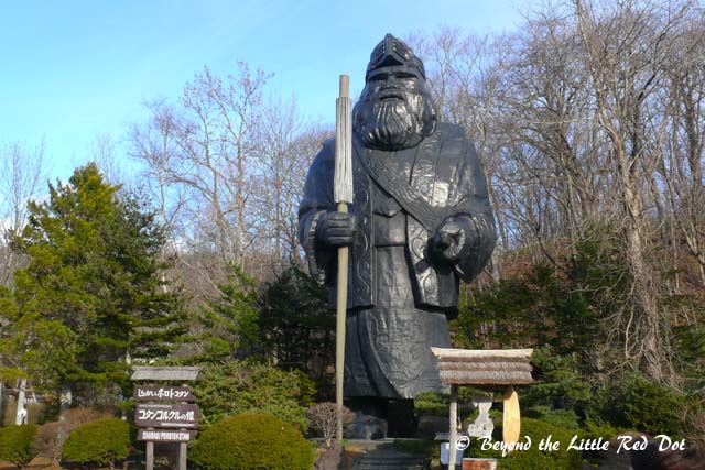 A statue of an Ainu warrior.