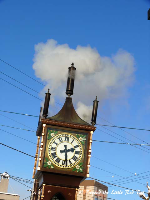 There is a steam powered clock just outside the Music Box Museum.