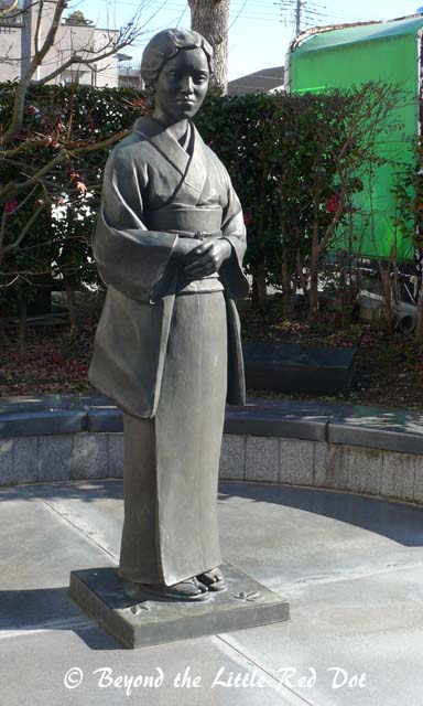 I'm not sure what this statue is but I think its Oshin, the long suffering daughter-in-law in Japanese history.