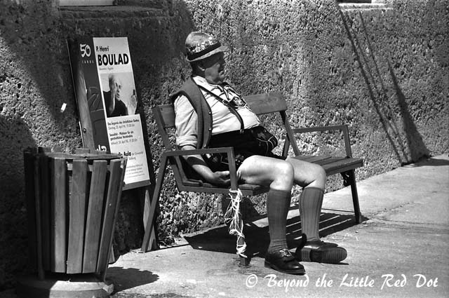 A tired old horse carriage driver.