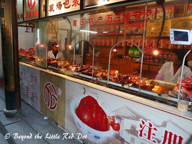 The local delicacy - pigs' trotters. Vacuum packed for take away.