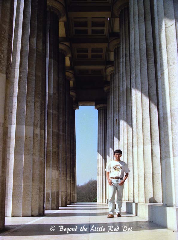 Standing amongst the massive Greek columns.