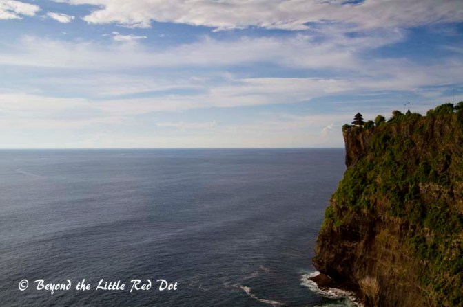 Impressive sight of the temple built along the cliff edge.