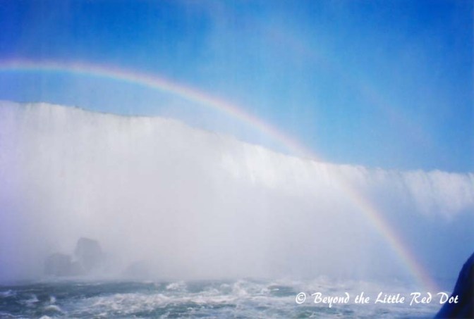An impromptu rainbow right at the edge of the falls.