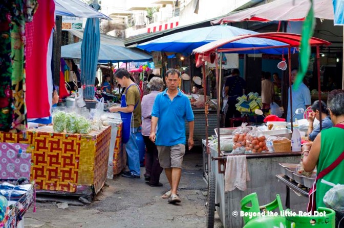 The narrow and congested street of the local market.