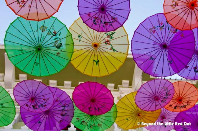More artsy stuff like colourful umbrellas hanging above us.