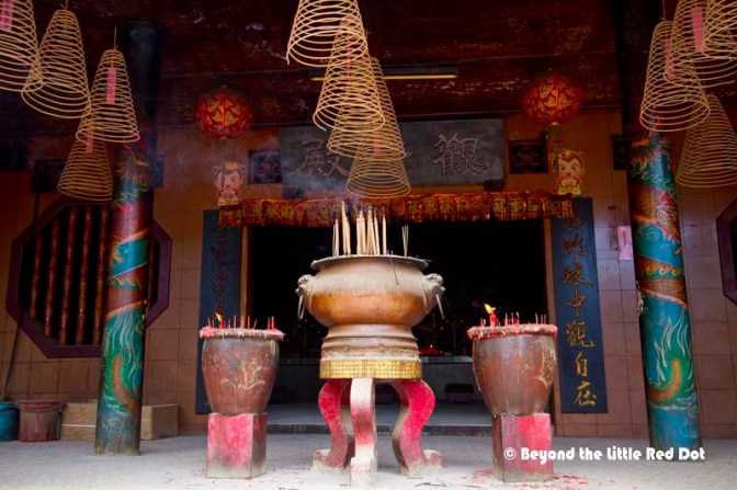 The entrance to Lin Seng Tong's cave temple. Well it wasn't really a big cave, more like an overhang of the limestone hill. The ceiling was blackened by the years of incense burning. 