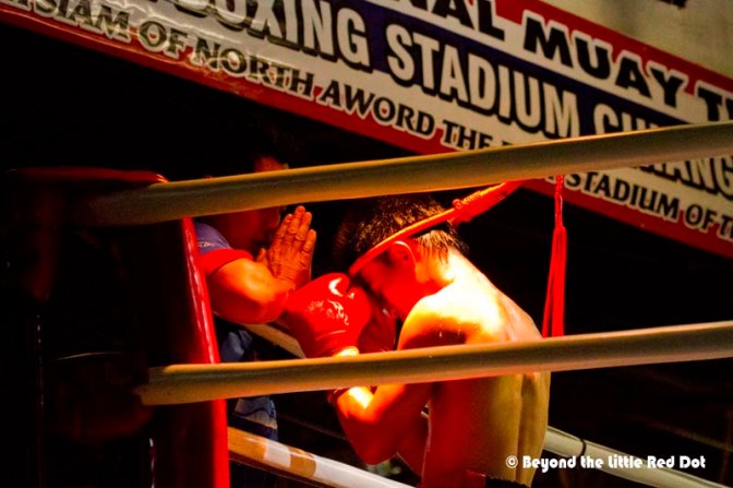 After the kids fight, it was time for the adults. And they came in by weight category. Here, a fighter does the traditional prayer for victory before the start of the fight.