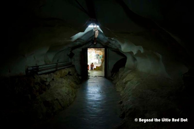 Following the cave to the back, there is a tunnel that leads to an opening inside the limestone hills.