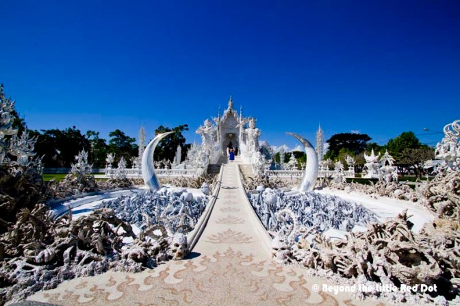 In order to get to the Ubosot, visitors have to cross a small bridge.