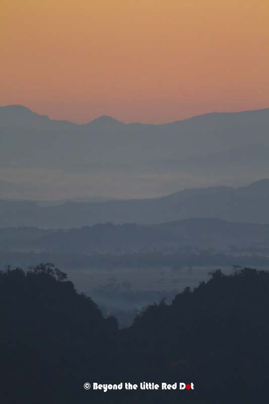 The beauty of the mountains in layers just before the sunrise.