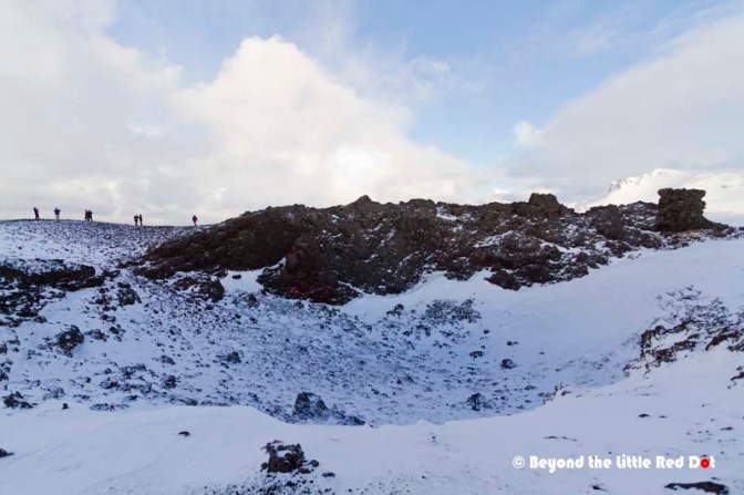 Once at the summit we could look into the crater, which was already filled with snow and loose rock.