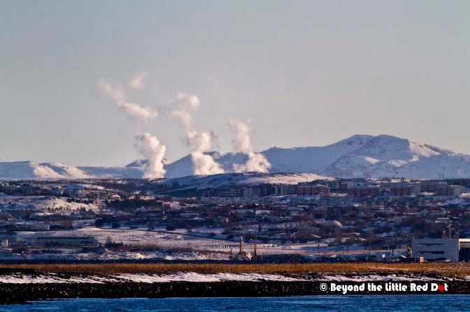 We could see steam from the geothermal hot springs that give rise to Reykjavik's name. In Icelandic Reykjavik means Smoky Bay. 