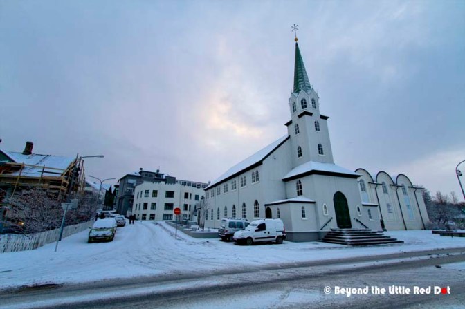 Our service apartment is the white building located behind the church. It's conveniently located and only 10 minutes walk to Reykjavik town center.