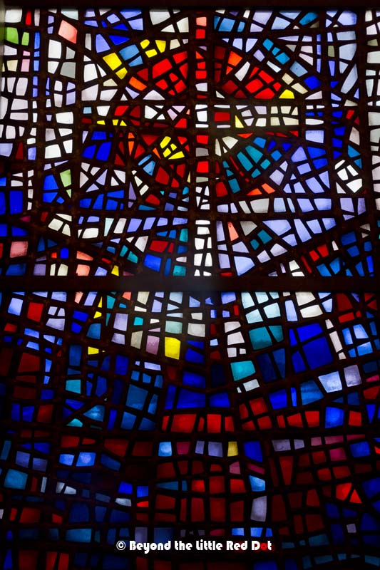 The stained glass windows are quite artistic.