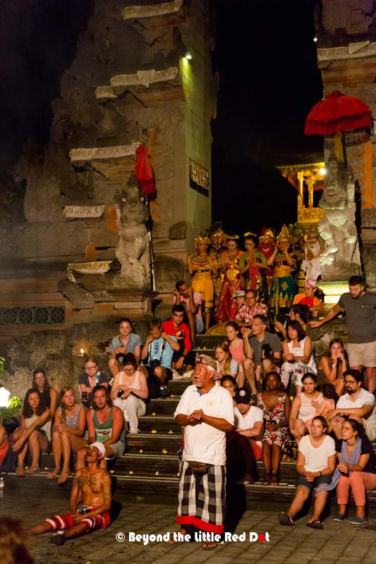 The priest concludes the performance and thanks everyone for coming.