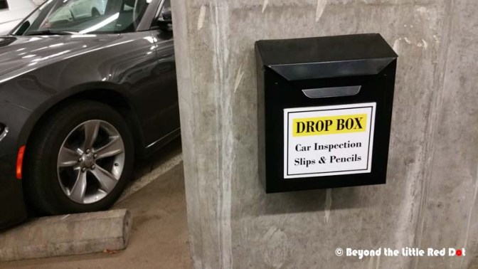 After paying, you collect your car from the parking lot. Unlike Asia, nobody goes with you to check the car. You have to check the car for any damages yourself, fill in the pre-inspection form and drop it in the black boxes shown above.