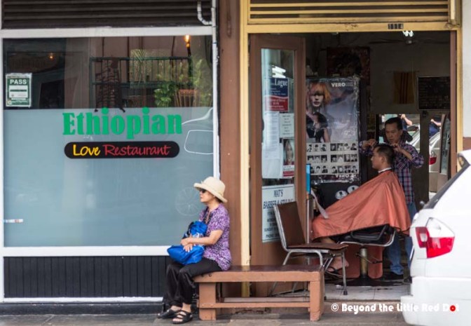Street life which would have look like it came out of Singapore in the 1960's.