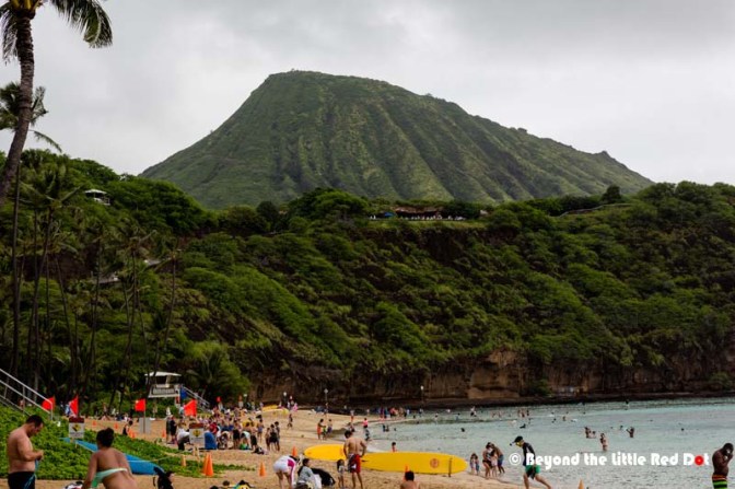 On the beach of Hanauma Bay, where you can see Koko Crater, another volcanic cone.