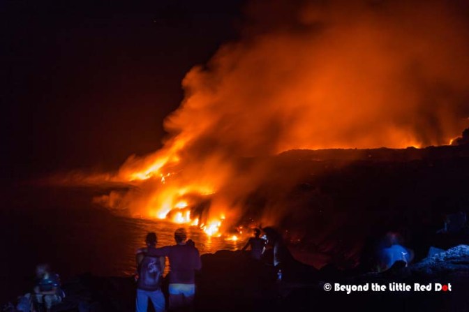 The road ended at the lava flow and we had to scramble over solidied lava flows to get nearer to the active lava flow Out of bounds area were cordened but nobody seemed to care about it, as everyone tried to get a prime spot.