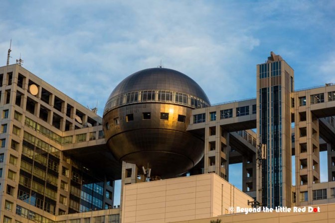That's no moon, that's some building that looks like the Death Star. Actually this is the FujiTV building.